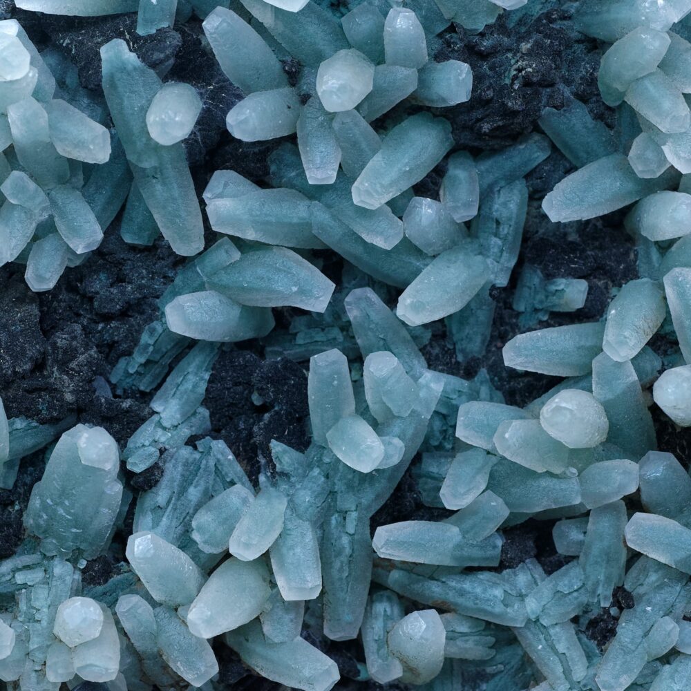 Abstract mineral texture with blue crystals